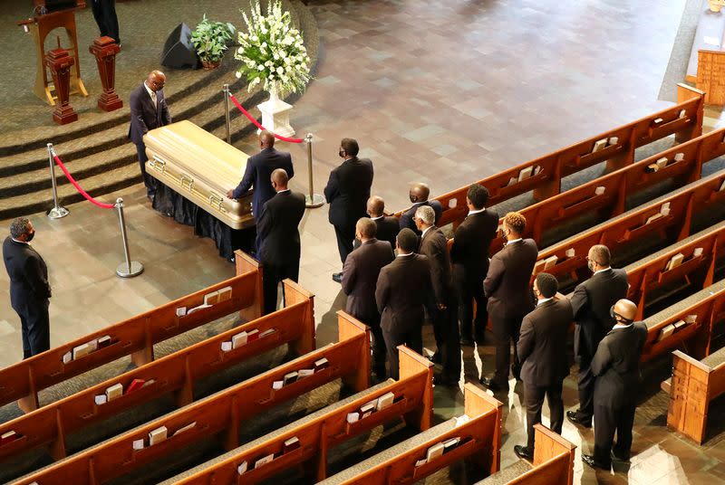 The coffin of Rayshard Brooks, who was shot dead by an Atlanta police officer, is brought into Ebenezer Baptist Church in Atlanta