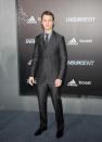 Elgort, with slicked back hair, completed his look with a light blue suit shirt and navy tie.