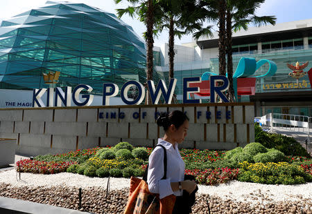 A woman walks in front of the King Power head office in Bangkok, Thailand October 28, 2018. REUTERS/Soe Zeya Tun