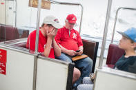 <p>Rep. Joe Barton, R-Texas, center, and his sons, board the Rayburn subway in the basement of the Capitol after a shooting at the Republican’s baseball practice in Alexandria on June 14, 2017. (Photo: Tom Williams/CQ Roll Call/Getty Images) </p>