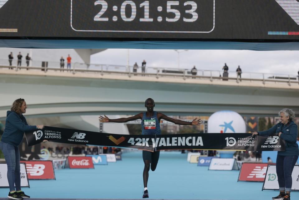 Kenyan athlete Kelvin Kiptum celebrates as he wins the men’s race at the Valencia Marathon (EPA)