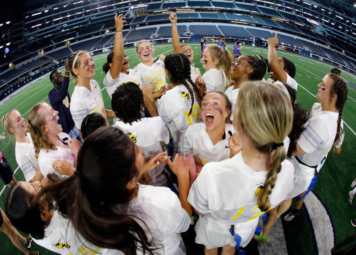 Arlington Heights girls celebrate after winning the Fort Worth ISD championship flag football game at ATT Stadium in Arlington, Texas, Wednesday, May 18, 2022. Arlington Heights defeated Eastern Hills . (Special to the Star-Telegram Bob Booth)