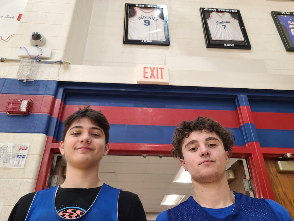 Cousins Carter Kent (left) and Keegan Manowitz (right) in front of Rob Kent’s Indiana All-Star jersey