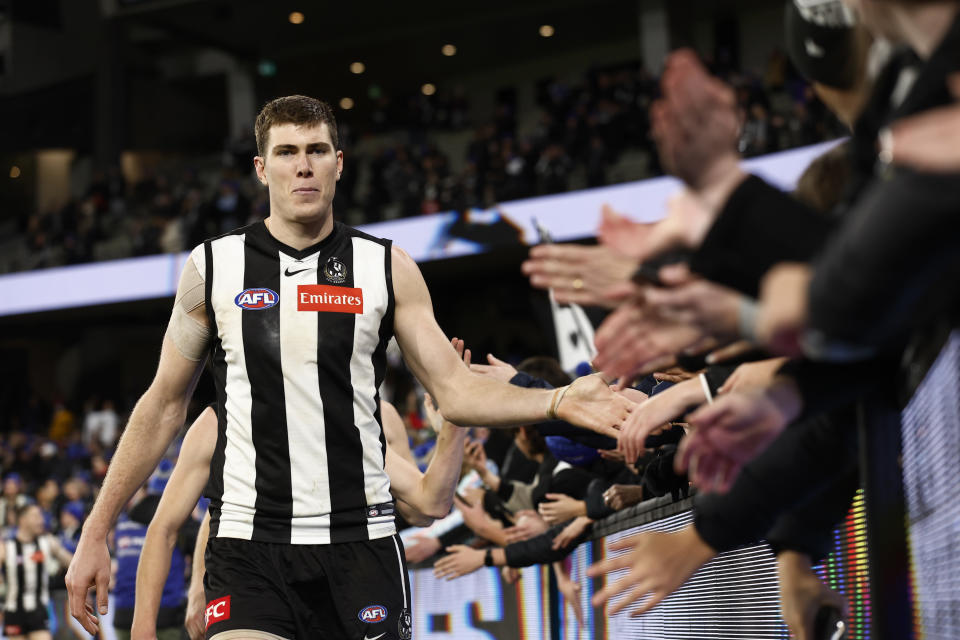 Mason Cox, pictured here acknowledging Collingwood fans after the Magpies' win over Melbourne.