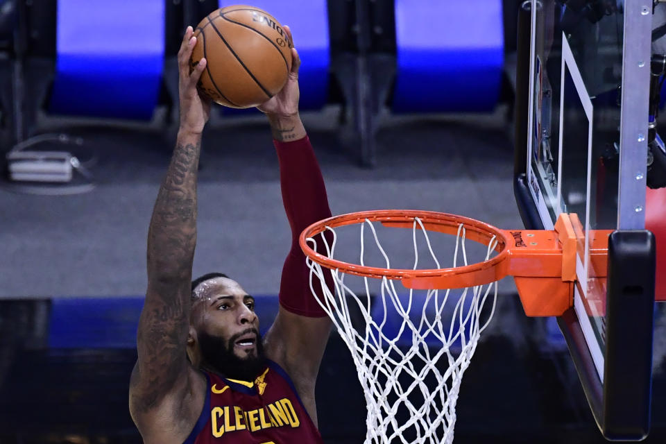 ORLANDO, FLORIDA - JANUARY 06: Andre Drummond #3 of the Cleveland Cavaliers slams the ball during the second quarter against the Orlando Magic at Amway Center on January 06, 2021 in Orlando, Florida. NOTE TO USER: User expressly acknowledges and agrees that, by downloading and or using this photograph, User is consenting to the terms and conditions of the Getty Images License Agreement. (Photo by Douglas P. DeFelice/Getty Images)