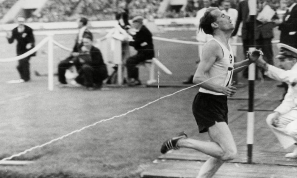 Derek Ibbotson breaking the world record for the mile at White City, London.