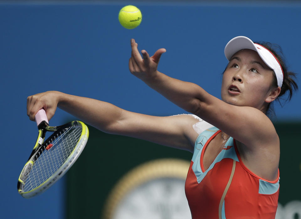 China's Peng Shuai  serves to Russia's Maria Kirilenko during their second round match at the Australian Open tennis championship in Melbourne, Australia, Thursday, Jan. 17, 2013. (AP Photo/Rob Griffith)