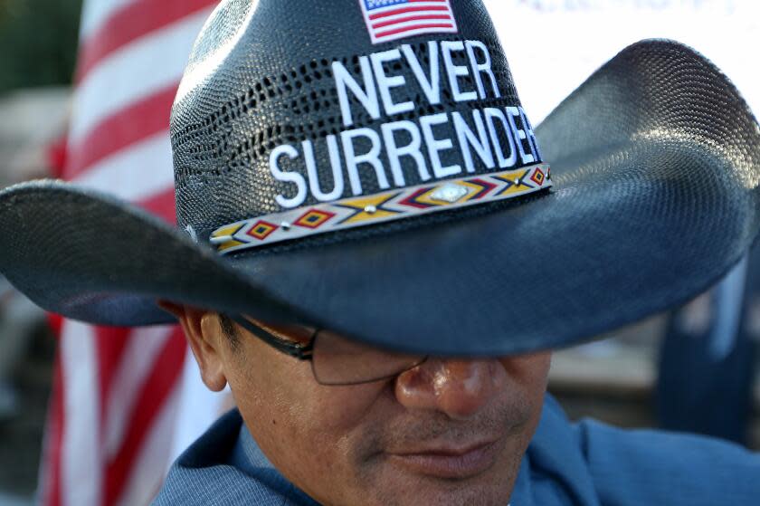 Simi Valley, CA - A supporter of former president Donald J. Trump who identified himself as Mr. T joins a rally at the intersection of Madera Road and Presidential Drive as GOP presidential candidates debate Wednesday, Sept. 27, 2023, at the Ronald Reagan Presidential Library in Simi Valley. Trump was not present at the second GOP presidential debate, which featured Florida Gov. Ron DeSantis, former Vice President Mike Pence, former U.N. Ambassador Nikki Haley, South Carolina Sen. Tim Scott and former New Jersey Gov. Chris Christie. (Luis Sinco / Los Angeles Times)