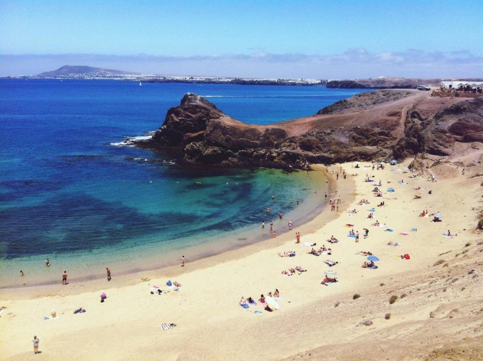 Lanzarote is a part of the Canary Islands off the west coast of Africa but is actually part of Spain. It has over 300 volcanic cones, some of the best beaches of the Canaries and landscape that's unlike anything else you've seen, with white sandy beaches juxtaposed with crinkly black lava fields. A must-see!