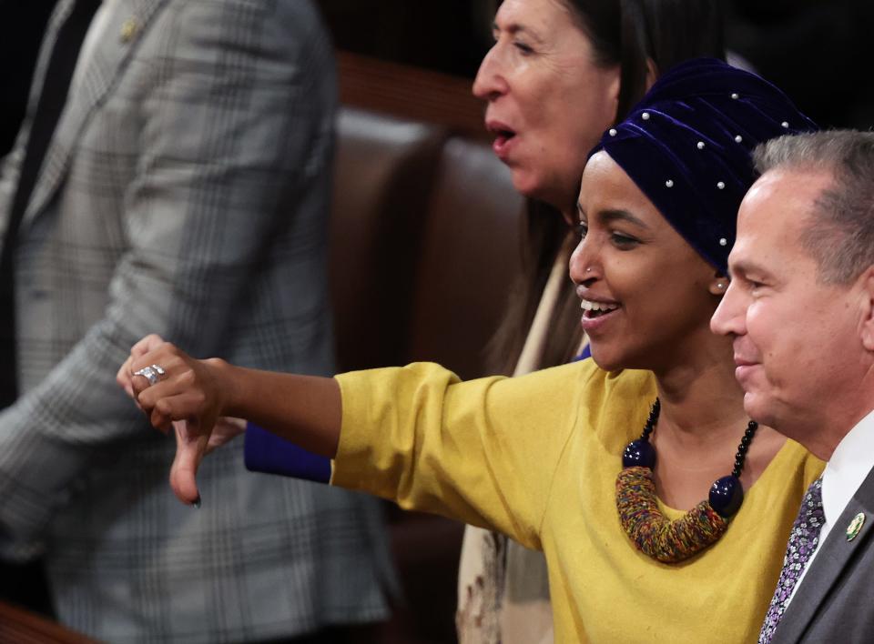 Rep.-elect Ilhan Omar (D-MN) gives a thumbs-down during a vote to adjourn in the House Chamber during the third day of elections for Speaker of the House at the U.S. Capitol Building on Jan. 5, 2023, in Washington, DC. The 118th House of Representatives has filed to select a speaker eleven times, and voting will resume on Jan. 6, 2023.