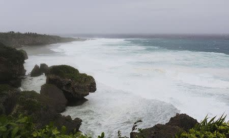 Waves are seen as super typhoon Neoguri approaches the region, at Cape Kyan in Itoman on Japan's southern island of Okinawa, in this photo taken by Kyodo July 7, 2014. REUTERS/Kyodo