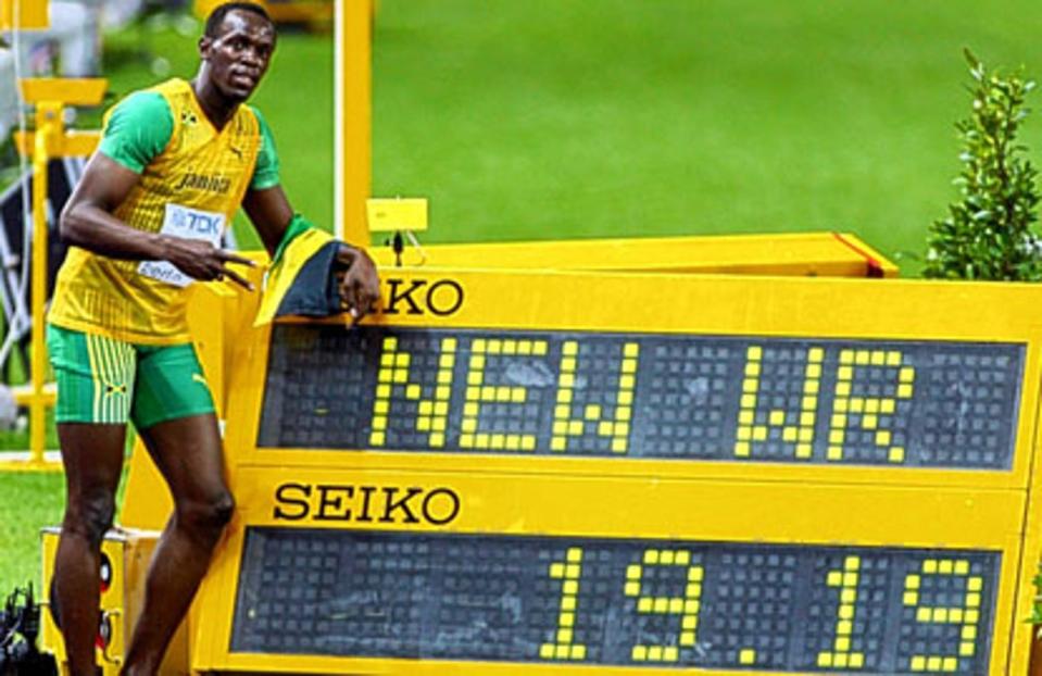 Time warp: Usain Bolt after setting yet another world record to complete his amazing sprint double in Berlin