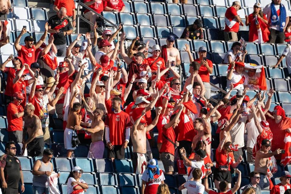 Canada fans cheer after getting a 1-0 victory over Peru in a Copa America match Tuesday at Children’s Mercy Park.