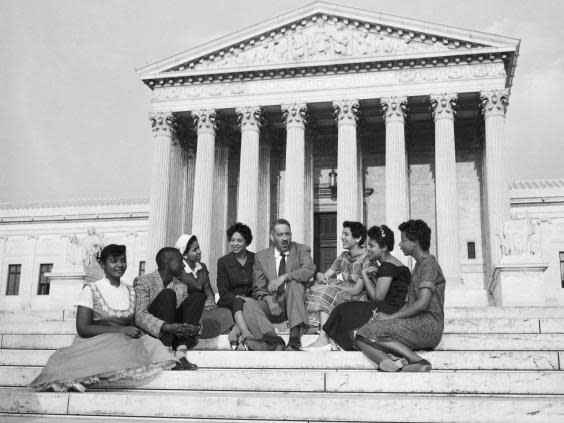 Free-speech champion Thurgood Marshall and civil-rights activist Daisy Bates visit students at Central High School (Bettmann Archive)