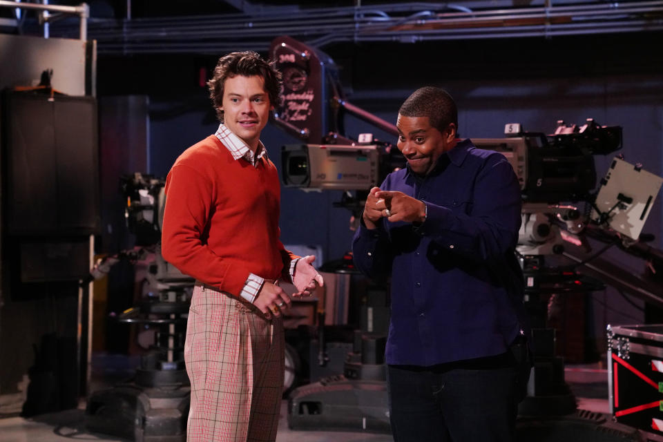 Harry Styles wears plaid trousers on &quot;Saturday Night Live.&quot; (Credit: Getty Images
