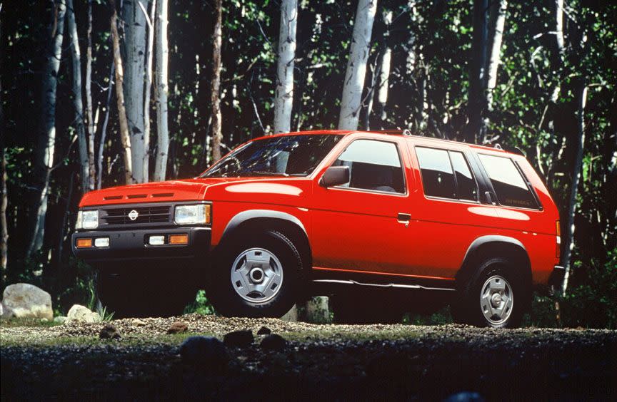 <p>Under the hood was a choice of a 2.4-liter four-cylinder or a 145-hp 3.0-liter V-6—a detuned version of the engine found in the 300ZX. The Pathfinder’'s chassis was based on Nissan's "Hardbody" pickup truck. But for the Pathfinder, Nissan chose to abandon the rear leaf springs in favor of a supple and modern coil-sprung suspension. Up until that point, it was mostly luxury SUVs that used coil springs. And that choice put the Pathfinder well ahead of its rivals in terms of ride and handling, on- and off-road.</p>