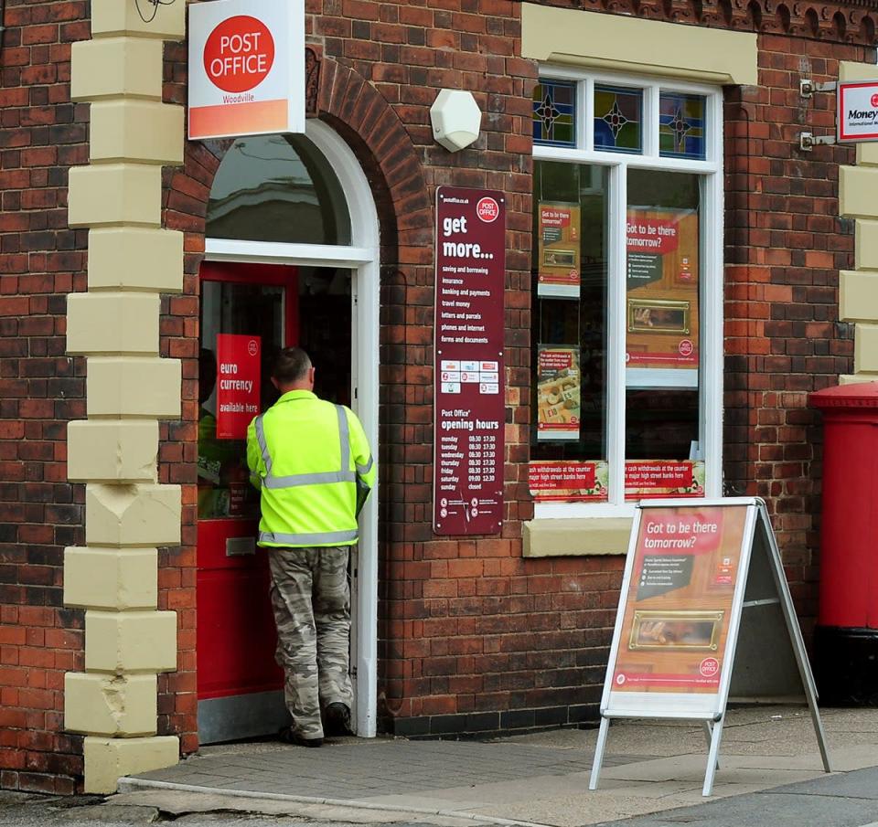 Post offices handled a record £801m in personal cash withdrawals in July (Rui Vieira/PA) (PA Archive)