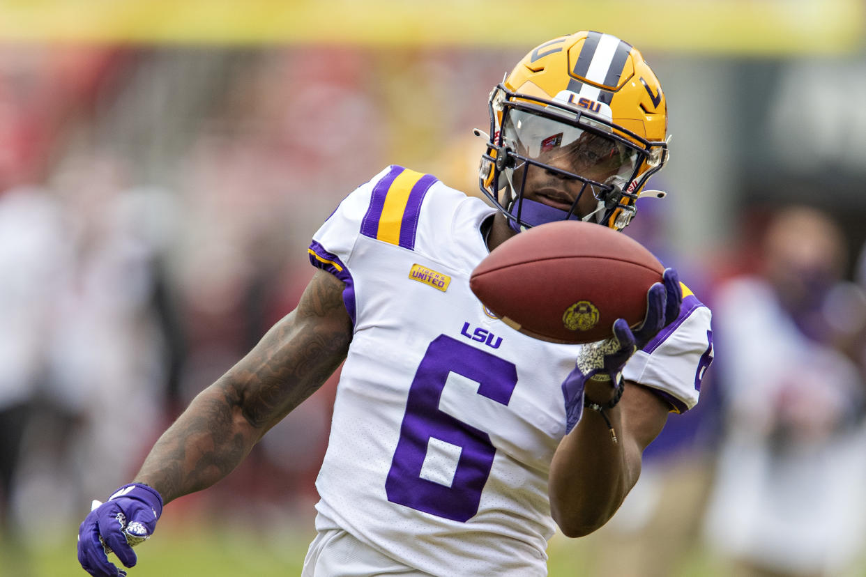 FAYETTEVILLE, AR - NOVEMBER 21:  Terrace Marshall Jr. #6 of the LSU Tigers warms up before a game against the Arkansas Razorbacks at Razorback Stadium on November 21, 2020 in Fayetteville, Arkansas.  The Tigers defeated the Razorbacks 27-24.  (Photo by Wesley Hitt/Getty Images)