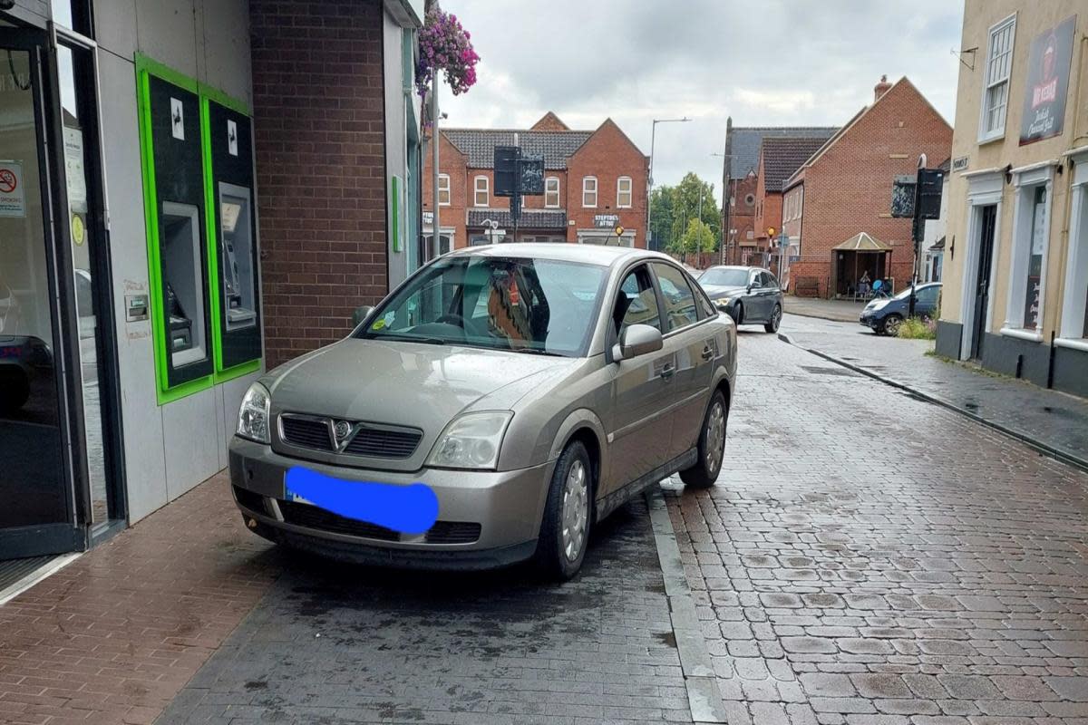 The Vauxhall driver was pulled over outside Lloyds Bank in Fakenham <i>(Image: Norfolk Police)</i>