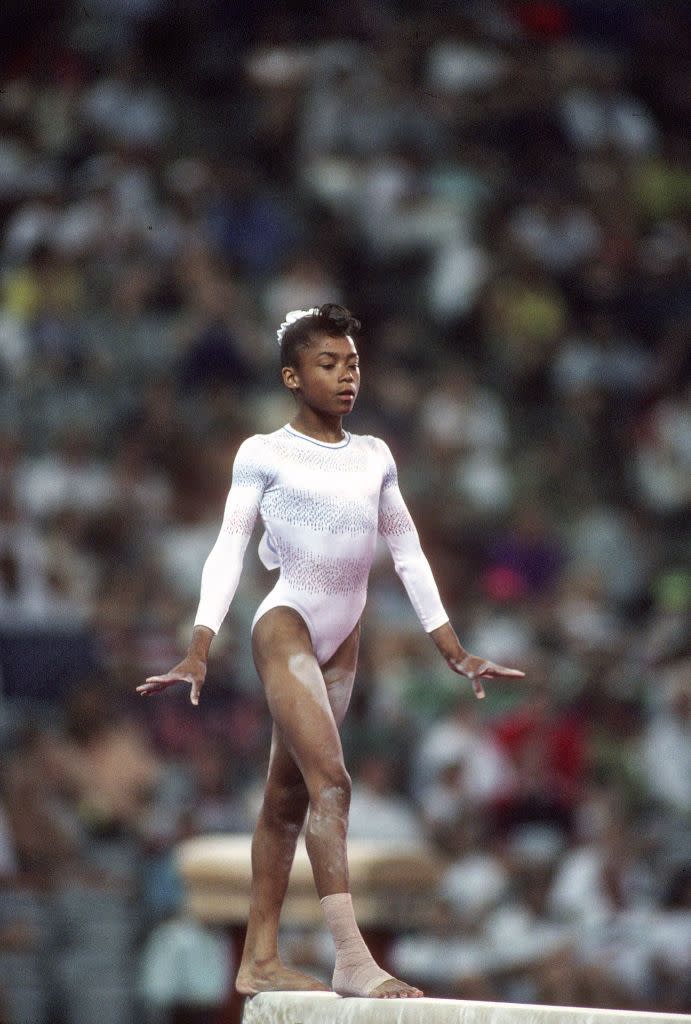 <p>Dominique Dawes first competed in the Olympics in 1992. Four years later, she became the <a href="https://usagym.org/pages/athletes/archivedbios/d/ddawes.html" rel="nofollow noopener" target="_blank" data-ylk="slk:first African-American gymnast;elm:context_link;itc:0;sec:content-canvas" class="link ">first African-American gymnast</a> to win an individual event medal. Known in the gymnastics world as "Awesome Dawesome," Dawes last competed in the Sydney Olympic Games in 2000. </p>