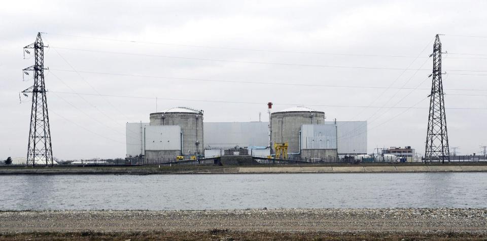 FILE - This March 18, 2011 file photo shows the Fessenheim nuclear plant, eastern France. France’s electricity utility company EDF said Wednesday, Sept. 5, 2012 that two people have suffered slight hand burns in a blast of steam at the country’s oldest nuclear reactor. (AP Photo/dapd, File)