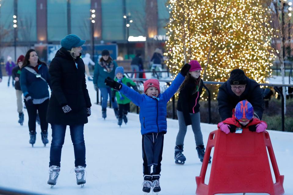 Ice skaters take to the ice Nov. 23, 2018, during the Winter Jubilee in the Titletown District in Ashwaubenon.