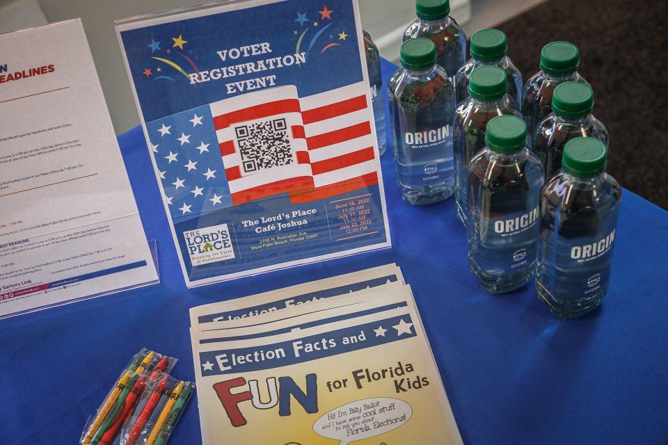 An assortment of informational literature sits on a table during a registration event June 16 at Café Joshua in West Palm Beach.