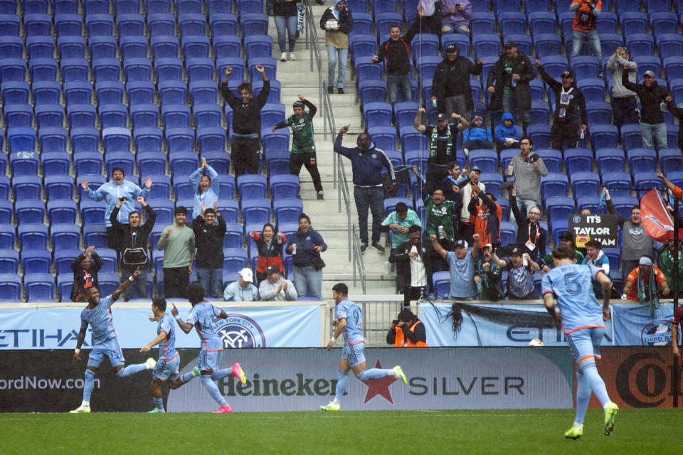 New York City FC's Andres Perea, left, celebrates after his goal against Toronto FC during an MLS soccer match at Red Bull Arena, Sunday, Sept. 24, 2023, in Harrison, N.J. (AP Photo/Andres Kudacki)