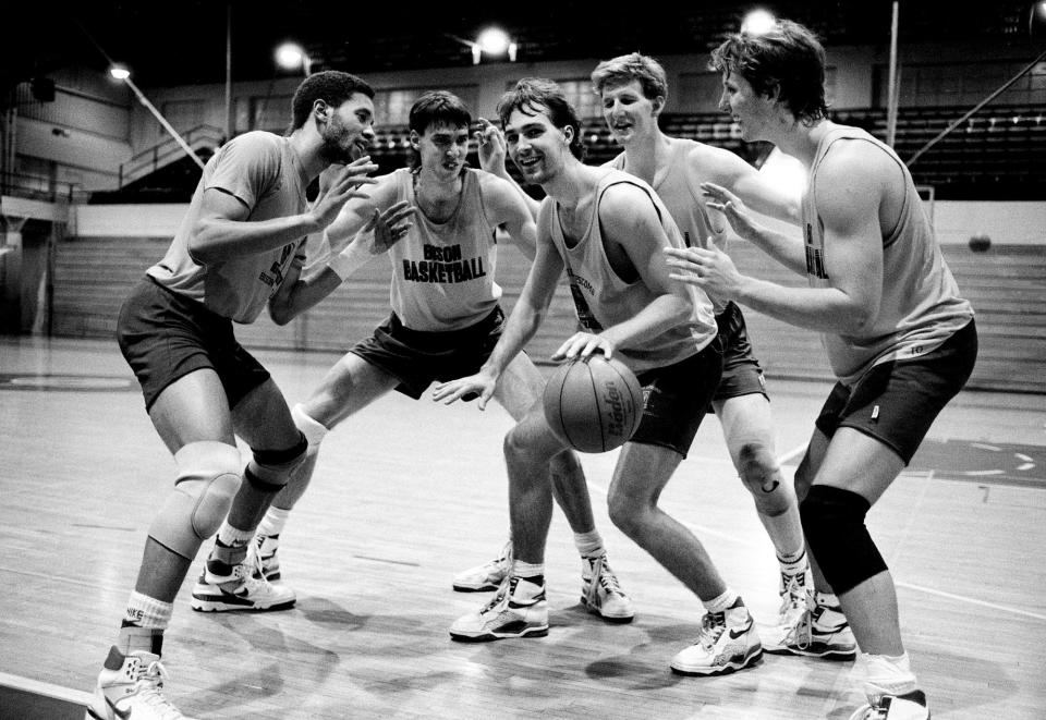 David Lipscomb seniors Marcus Bodie, left, Darrin Henrie, Philip Hutcheson and Wade Tomlinson surround freshman Jerry Meyer, center, during a lite moment in practice Oct. 24, 1988. Meyer is attempting to dribble his way into the Bisons lineup as the team has been ranked No. 1 in the NAIA preseason poll.