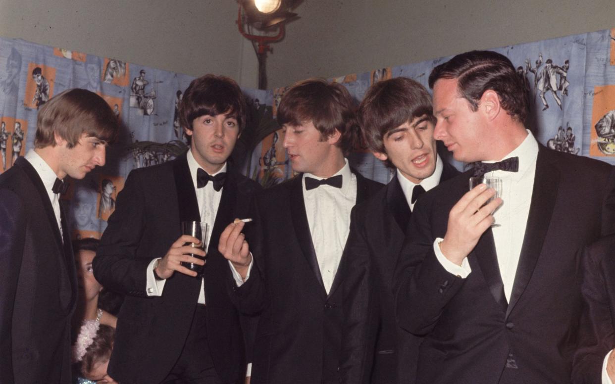 The Beatles with Brian Epstein, right - Hulton Archive/Getty Images