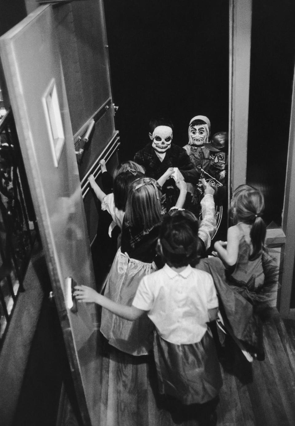 <p><em><strong>In what century did the tradition of trick or treating begin?</strong></em></p><p><strong>Answer: </strong>The American tradition of trick or treating dates back to the 1920s but in Europe, as early as the 16th century people were known to go from door to door on Halloween night asking for food, reciting verses, wearing costumes, and warning of curses if they didn't get a warm welcome. </p>