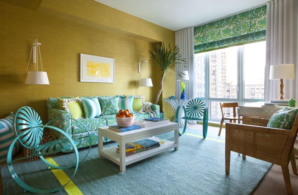 <p>A neutral, textured wallcovering helps these turquoise accents pop. Design by <a href="https://deringhall.com/interior-designers/scott-sanders" rel="nofollow noopener" target="_blank" data-ylk="slk:Scott Sanders;elm:context_link;itc:0;sec:content-canvas" class="link ">Scott Sanders</a>.</p>