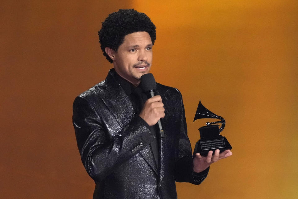 Host Trevor Noah presents the Dr. Dre Global Impact Award to Jay-Z during the 66th annual Grammy Awards on Sunday, Feb. 4, 2024, in Los Angeles. (AP Photo/Chris Pizzello)