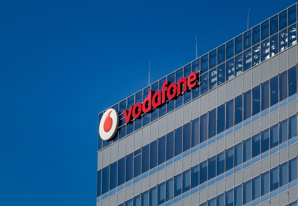 Bucharest, Romania - December 09, 2019: A logo of Vodafone, British telecommunications company, is seen on the top of Globalworth Tower building, in Bucharest. This image is for editorial use only.