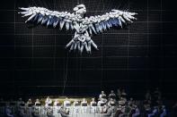 <p>Acrobats came together to form a dove, symbolizing a call for peace, at the Opening Ceremony of the 2006 Winter Games. (Getty) </p>