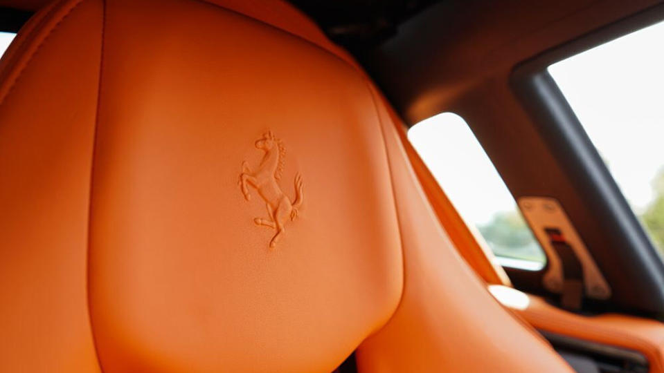 The interior is finished in orange leather by Hermés. - Credit: Paddlup