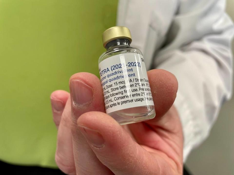 A vial of the influenza vaccine at a pharmacy in Moncton, N.B. Dr. Gerald Evans, an infectious disease specialist at Queen's University, has suspected misinformation could extend and lead to hesitancy about flu shots. (Alexandre Silberman/CBC - image credit)