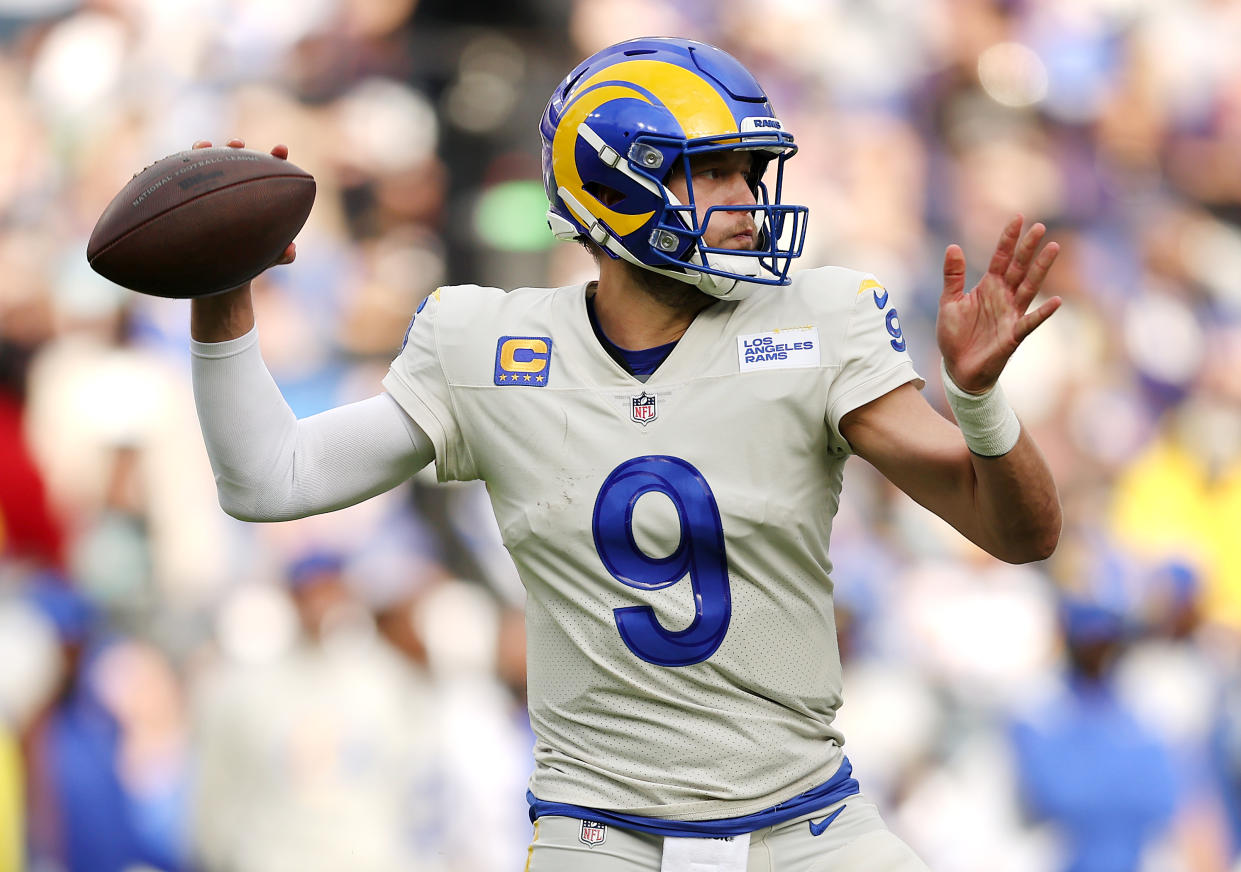 Rams QB Matthew Stafford turned the ball over three times but led two late TD drives. (Photo by Patrick Smith/Getty Images)