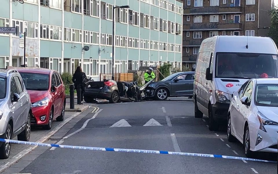 Two officers were taken to hospital after the collision - TWITTER
