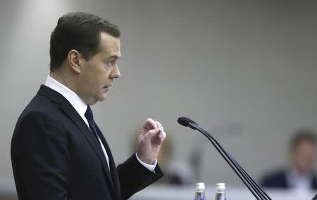 Russian Prime Minister Dmitry Medvedev delivers a speech during a session at the State Duma, the lower house of parliament, in Moscow, April 21, 2015. REUTERS/Dmitry Astakhov/RIA Novosti/Pool