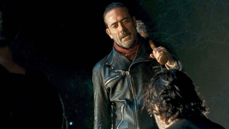 Negan stands over Rick holding Lucille, a barbed wire baseball bat that is one of the best horror weapons of all-time