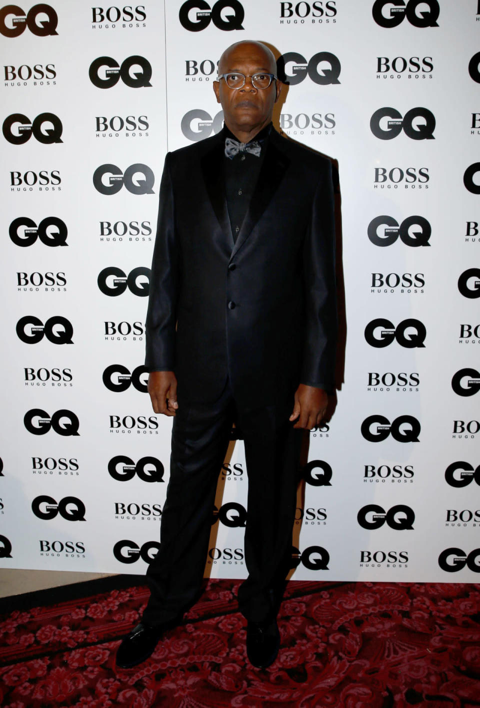 Samuel L. Jackson, you never fail to wow us. Even in a simple satin suit he looked perfect. [Photo: Rex]