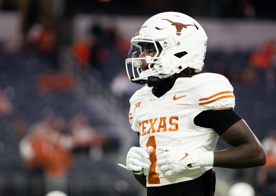 Dec 2, 2023; Arlington, Texas, USA; Texas wide receiver Xavier Worthy (1) warms up before the Big 12 Conference Championship game between the Texas Longhorns and the Oklahoma State Cowboys. Mandatory Credit: Sara Diggins/American-Statesman via USA TODAY NETWORK