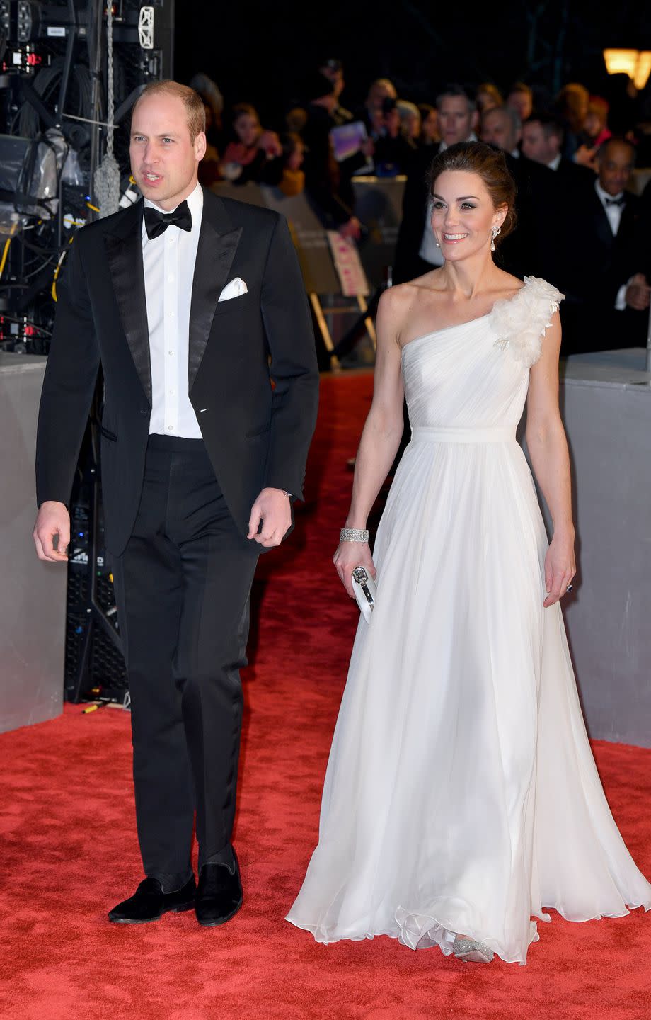 <p>Kate wore a white Alexander McQueen gown to the 2019 BAFTAs, paired with <a rel="nofollow noopener" href="http://www.selfridges.com/GB/en/cat/jimmy-choo-romy-85-speckled-glitter-courts_834-10132-J000108848/" target="_blank" data-ylk="slk:glittering Jimmy Choo court shoes;elm:context_link;itc:0;sec:content-canvas" class="link ">glittering Jimmy Choo court shoes</a> and <a rel="nofollow noopener" href="https://www.harpersbazaar.com/uk/fashion/jewellery-watches/a26282545/kate-middleton-princess-diana-earrings-tribute-baftas-2019/" target="_blank" data-ylk="slk:earrings that once belonged to Princess Diana;elm:context_link;itc:0;sec:content-canvas" class="link ">earrings that once belonged to Princess Diana</a>. William was dapper in a black tux and bow-tie.</p>