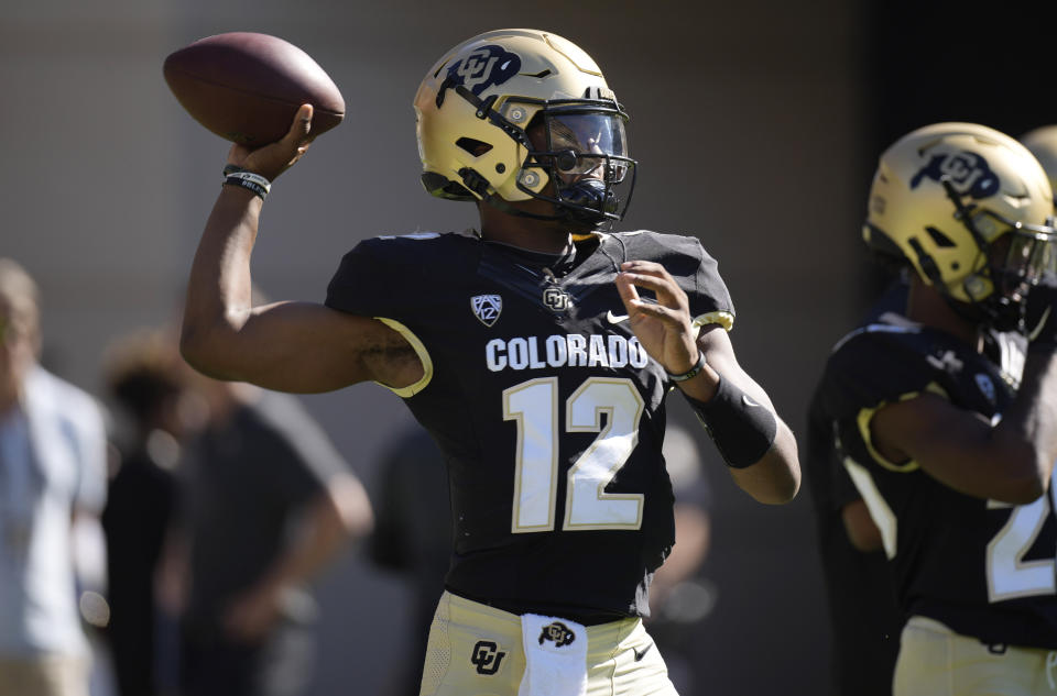 Colorado quarterback Brendon Lewis warms up before an NCAA college football game against Minnesota, Saturday, Sept. 18, 2021, in Boulder, Colo. (AP Photo/David Zalubowski)