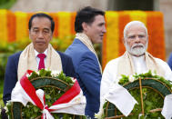 Canada's Prime Minister Justin Trudeau, center, walks past India's Prime Minister Narendra Modi, right, and Indonesia's President Joko Widodo as they take part in a wreath-laying ceremony at Raj Ghat (Mahatma Gandhi's cremation site) during the G20 Summit in New Delhi, Sunday, Sept. 10, 2023. On Monday, Sept. 18, Canada expelled a top Indian diplomat as it investigates what Trudeau called credible allegations that India’s government may have had links to the assassination in Canada of a Sikh activist. Trudeau told Parliament that he brought up the slaying with Modi at the G-20. (Sean Kilpatrick/The Canadian Press via AP)