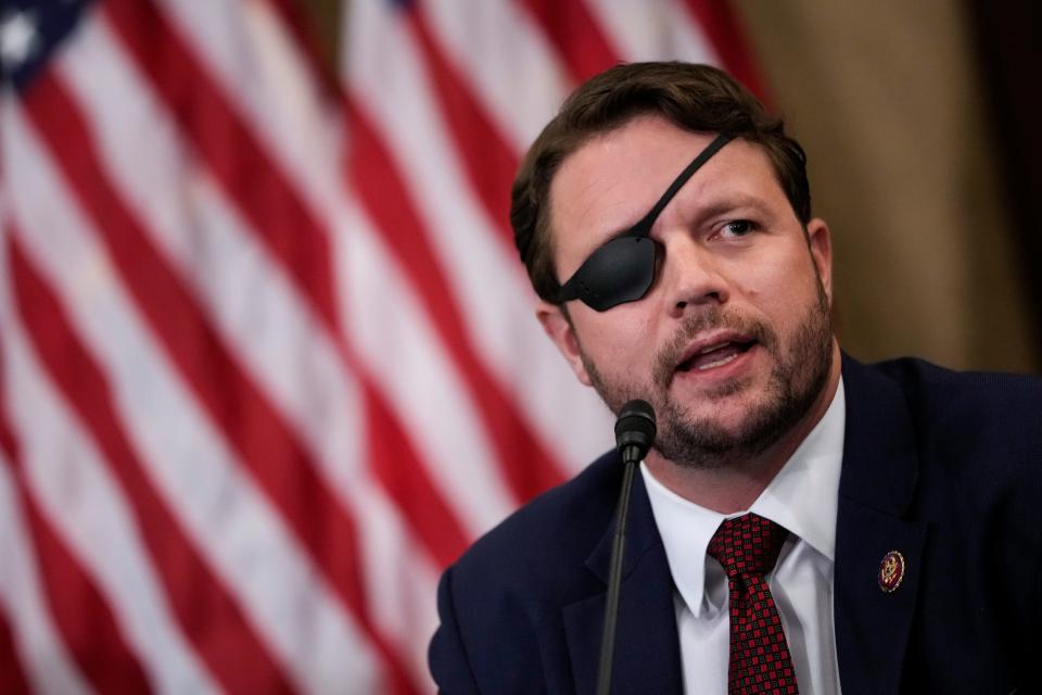 Republican Rep. Dan Crenshaw of Texas speaks during a meeting with House Republicans on August 30, 2021 in Washington, DC.