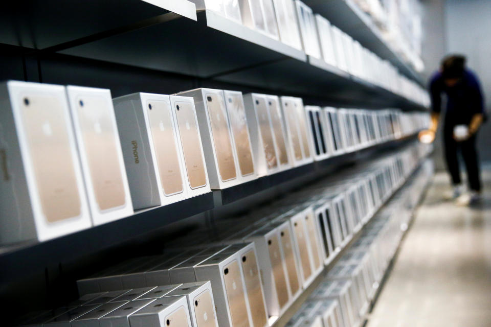 Apple's new iPhone 7 smartphones sit on a shelf at an Apple store in Beijing, China, September 16, 2016. REUTERS/Thomas Peter