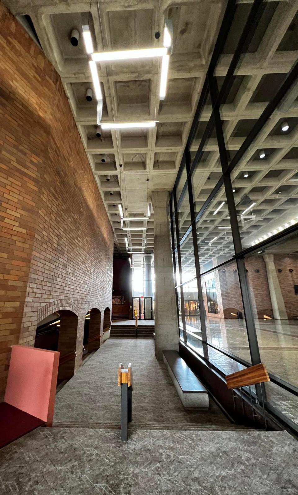 The Cultural Center for the Arts Theater lobby has been renovated with an expanded exit area, new carpet and new stylized overhead lighting.