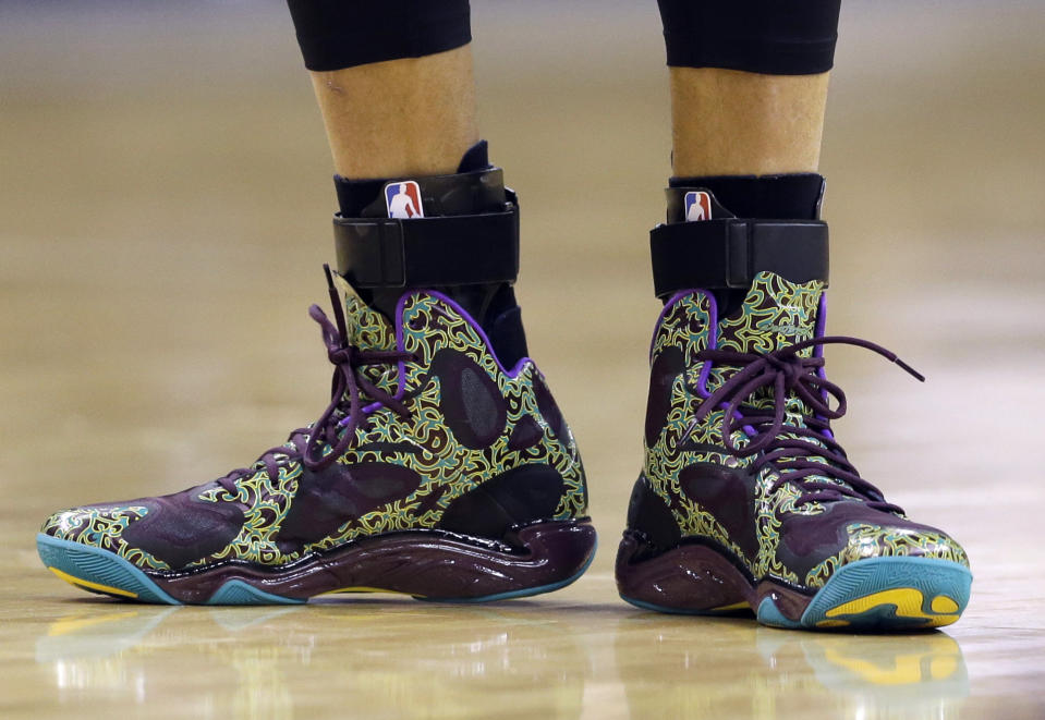 Golden State Warriors' Stephen Curry shoes a seen during the first half of an NBA basketball game against the Indiana Pacers Tuesday, March 4, 2014, in Indianapolis. (AP Photo/Darron Cummings)